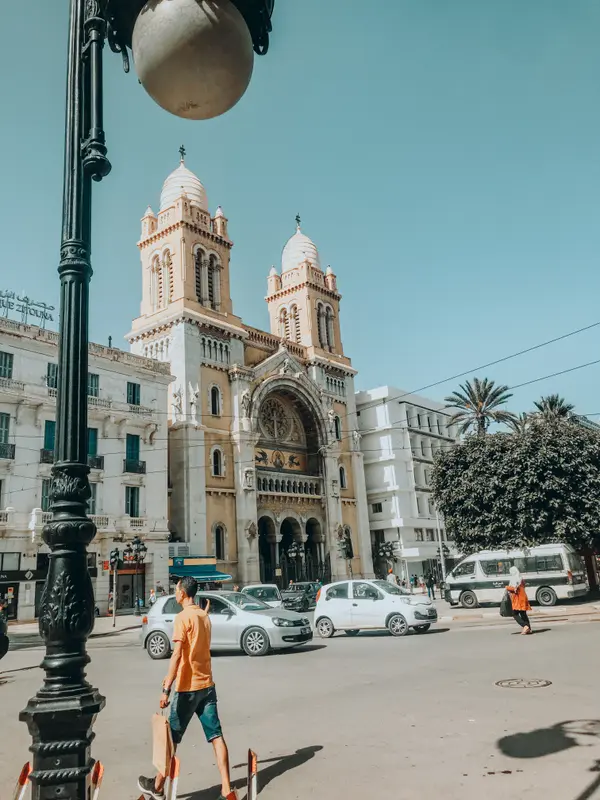 Cathedral of St. Vincent de Paul in downtown Tunis with pedestrians — Aziz Stiti architecture photography