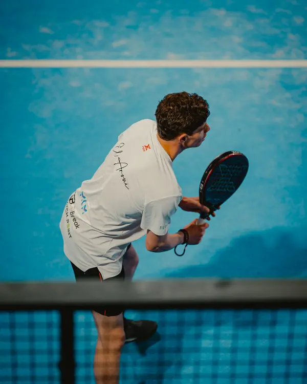 Padel player action shot — Aziz Stiti sports